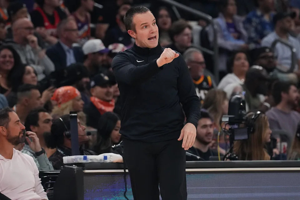 Phoenix Suns head coach Jordan Ott yells out to his team as they play the Houston Rockets at the Mortgage Matchup Center in Phoenix, on April 7, 2026.