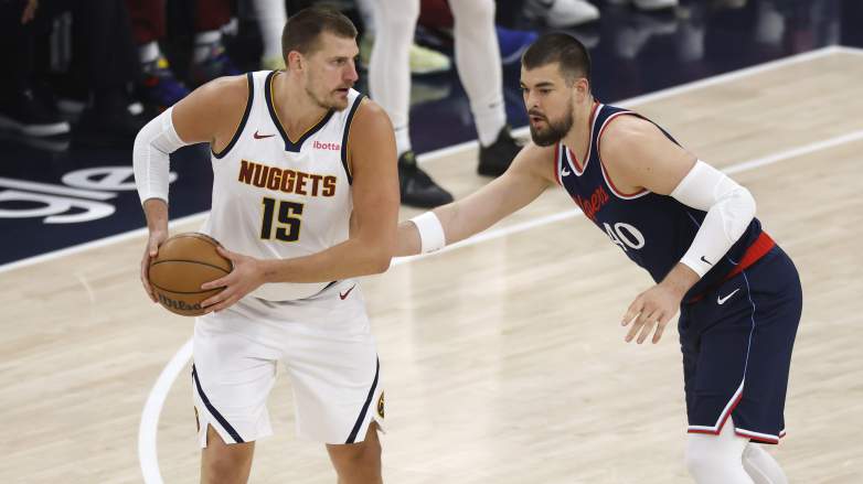 Denver Nuggets center Nikola Jokic guarded by LA Clippers center Ivica Zubac