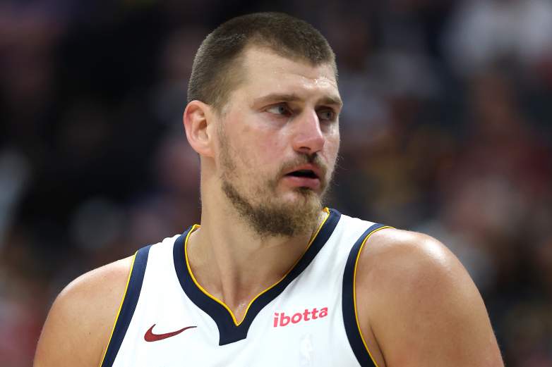 Denver Nuggets MVP Nikola Jokic looks on during an NBA game.