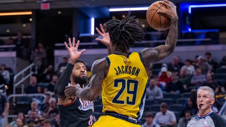 Philadelphia 76ers forward Paul George (8) braces as Indiana Pacers...