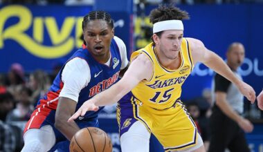 Detroit Pistons guard/forward Ausar Thompson (9) knocks the ball from Los Angeles Lakers guard Austin Reaves (15) in the first half. Detroit Pistons vs Los Angeles Lakers, at Little Caesars Arena on Monday, March 23, 2026, in Detroit, Mich.