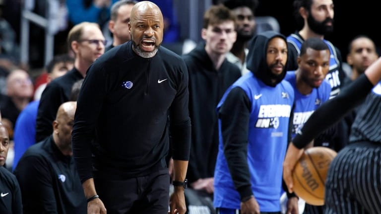 Orlando Magic head coach Jamahl Mosley shouts at his team...