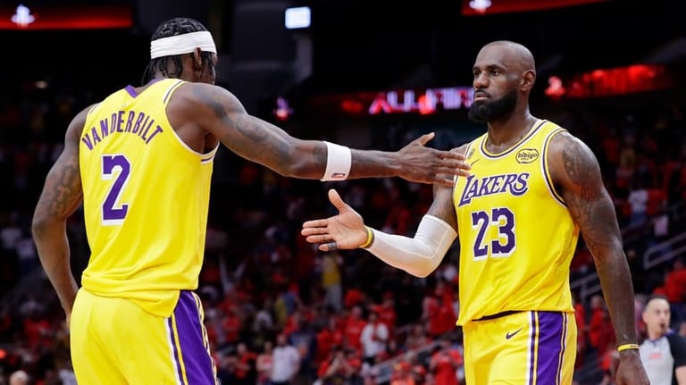 Los Angeles Lakers forwards Jarred Vanderbilt (2) and LeBron James...