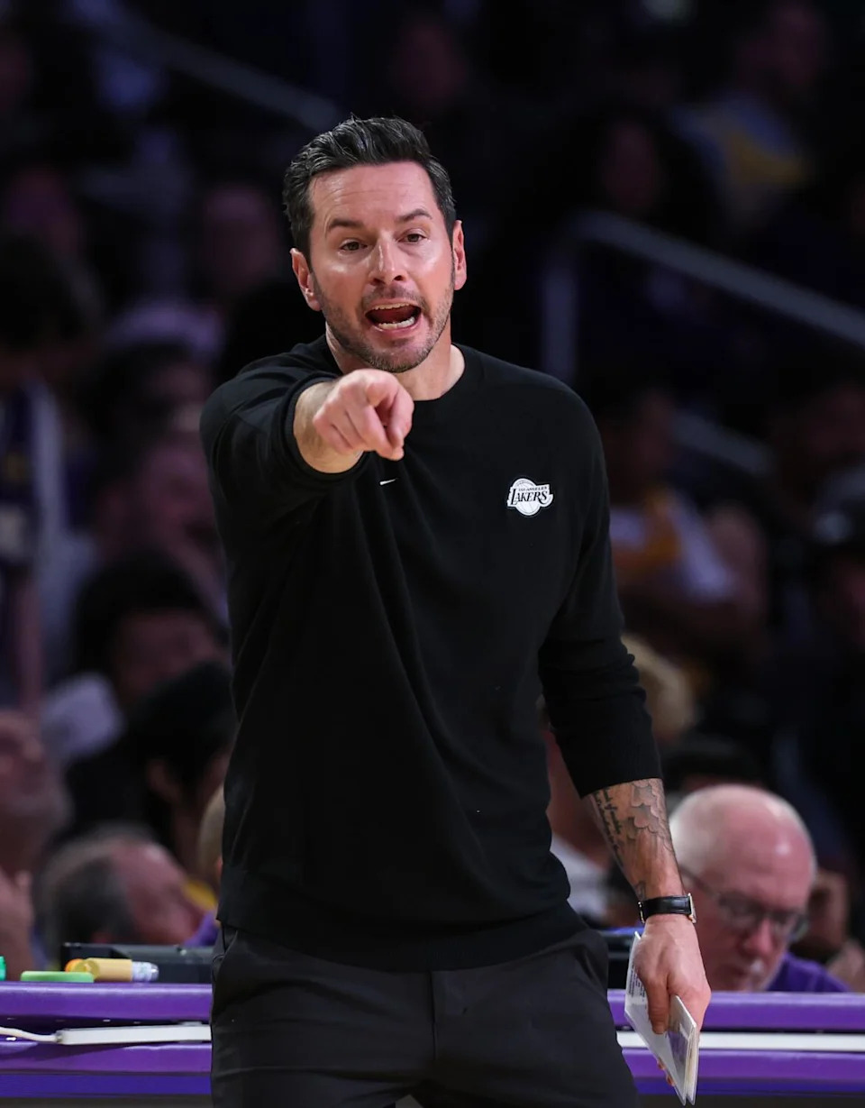 Lakers coach JJ Redick directs players during a blowout loss to the Thunder on Tuesday.
