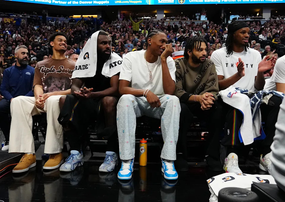 Apr 10, 2026; Denver, Colorado, USA; Members of the Denver Nuggets on the bench during the second half against the Oklahoma City Thunder at Ball Arena. Mandatory Credit: Ron Chenoy-Imagn Images