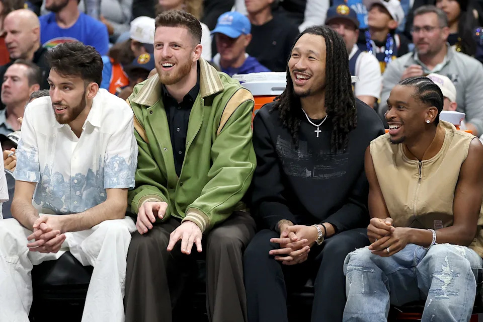 DENVER, COLORADO - APRIL 10: Chet Holmgren #7, Isaiah Hartenstein #55, Jalen Williams #8, Shai Gilgeous-Alexander #2 of the Oklahoma City Thunder watch the game against the Denver Nuggets during the first quarter at Ball Arena on April 10, 2026 in Denver, Colorado. NOTE TO USER: User expressly acknowledges and agrees that, by downloading and or using this photograph, User is consenting to the terms and conditions of the Getty Images License Agreement. (Photo by Matthew Stockman/Getty Images)
