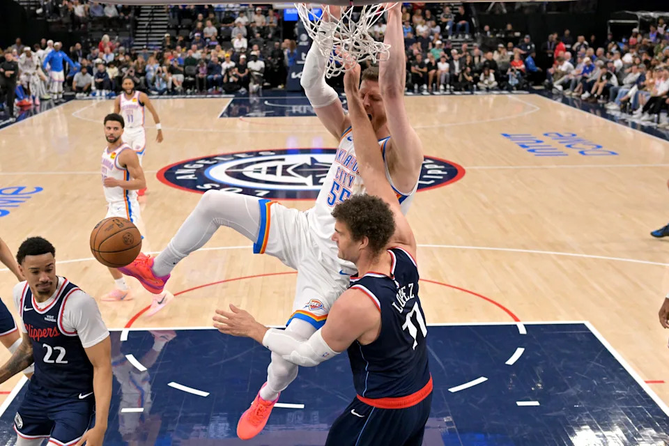 Apr 8, 2026; Inglewood, California, USA; Oklahoma City Thunder center Isaiah Hartenstein (55) dunks over Los Angeles Clippers center Brook Lopez (11) in the second half at Intuit Dome. Mandatory Credit: Jayne Kamin-Oncea-Imagn Images