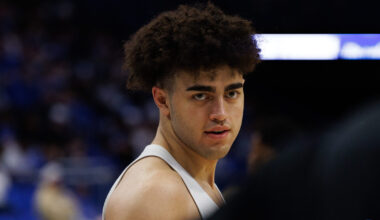 Mar 12, 2026; Nashville, TN, USA; Kentucky Wildcats guard Denzel Aberdeen (1) dribbles the ball past Missouri Tigers guard Anthony Robinson II (0) during the second half at Bridgestone Arena. Mandatory Credit: Steve Roberts-Imagn