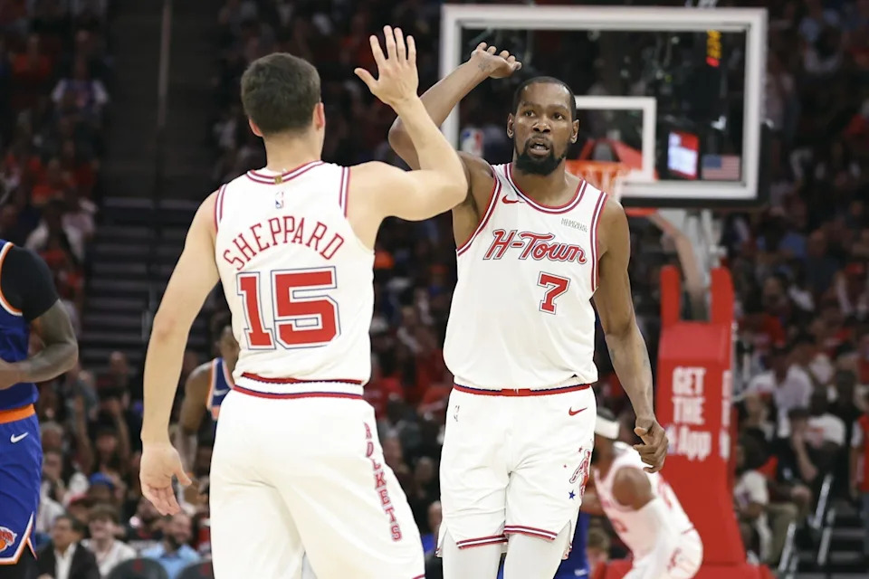 Mar 31, 2026; Houston, Texas, USA; Houston Rockets forward Kevin Durant (7) and guard Reed Sheppard (15) react after a play during the third quarter against the New York Knicks at Toyota Center. Mandatory Credit: Troy Taormina-Imagn Images