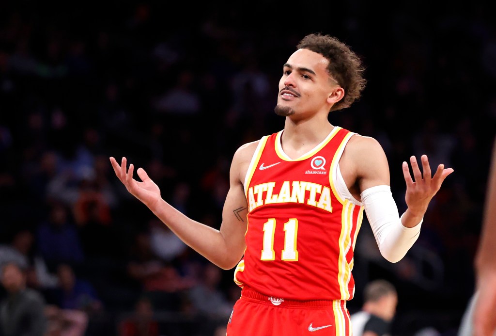 Atlanta Hawks guard Trae Young reacts while on the court in the second half