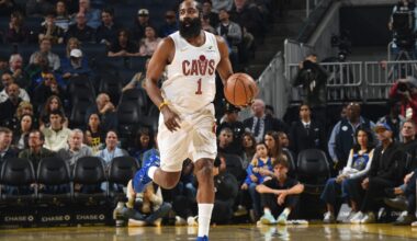 James Harden brings the ball up the court.