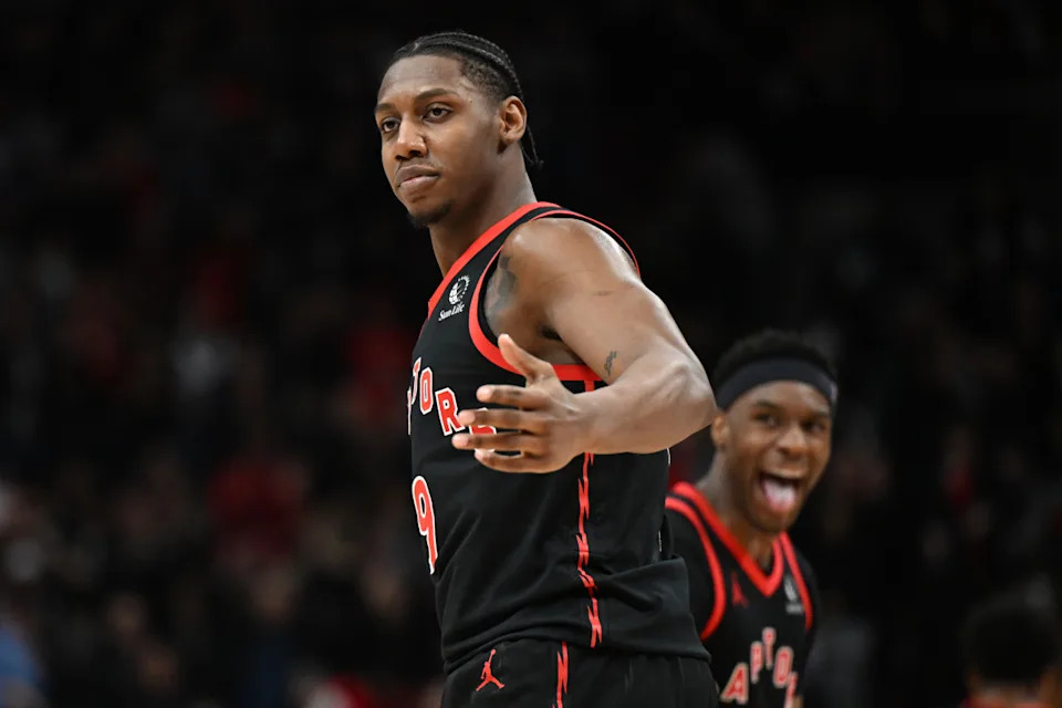 Toronto Raptors forward RJ Barrett (9) celebrates with guard Ja'Kobe Walter (14) after making a basket against the Phoenix Suns in the second half at Scotiabank Arena.<br> © Dan Hamilton-Imagn Images