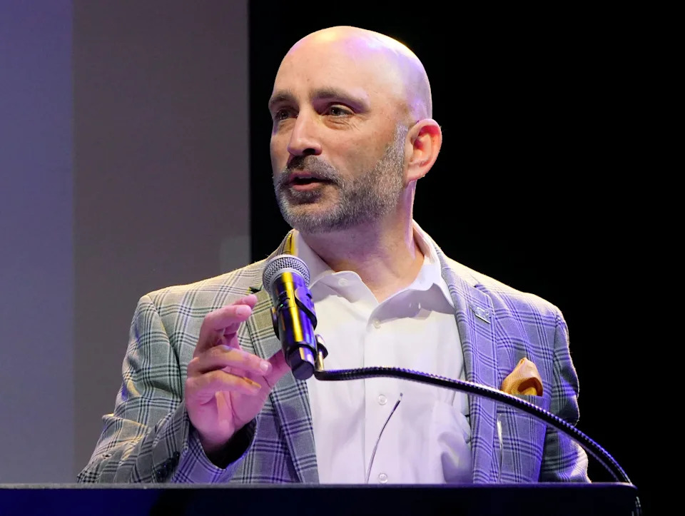 University of Akron men's basketball coach Dustin Ford speaks during the event introducing him as the new Zips coach on April 15, 2026, in Akron.
