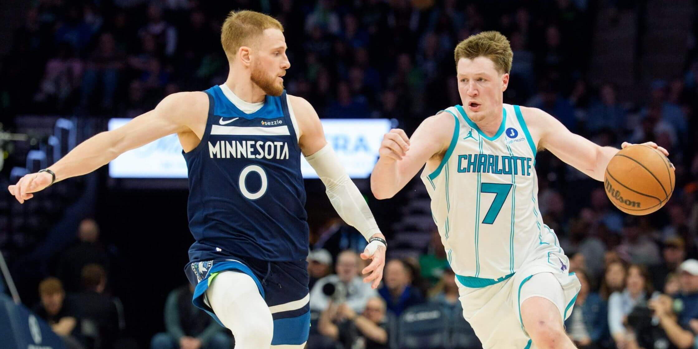 Minnesota's Donte DiVincenzo and Charlotte's Kon Knueppel