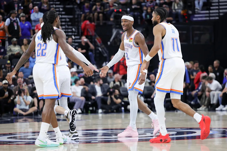 INGLEWOOD, CALIFORNIA - APRIL 08: Shai Gilgeous-Alexander #2 of the Oklahoma City Thunder speaks with Cason Wallace #22 and Isaiah Joe #11 during the second half of an NBA game against the Los Angeles Clippers at Intuit Dome on April 08, 2026 in Inglewood, California. NOTE TO USER: User expressly acknowledges and agrees that, by downloading and or using this photograph, User is consenting to the terms and conditions of the Getty Images License Agreement. (Photo by Ryan Sirius Sun/Getty Images)