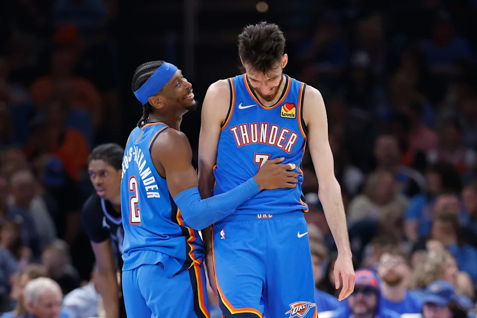 Apr 5, 2026; Oklahoma City, Oklahoma, USA; Oklahoma City Thunder guard Shai Gilgeous-Alexander (2) and center Chet Holmgren (7) laugh after a play against the Utah Jazz during the second half at Paycom Center. Mandatory Credit: Alonzo Adams-Imagn Images