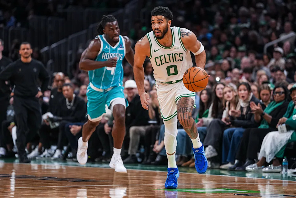 Apr 7, 2026; Boston, Massachusetts, USA; Boston Celtics forward Jayson Tatum (0) returns the ball against Charlotte Hornets guard Sion James (4) in the second quarter at TD Garden. Mandatory Credit: David Butler II-Imagn Images