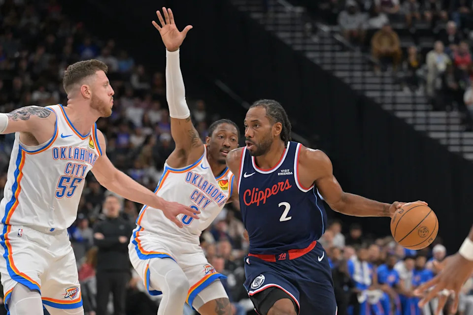 Apr 8, 2026; Inglewood, California, USA; Oklahoma City Thunder guard Luguentz Dort (5) defends a shot by Los Angeles Clippers forward Kawhi Leonard (2) in the first half at Intuit Dome. Mandatory Credit: Jayne Kamin-Oncea-Imagn Images