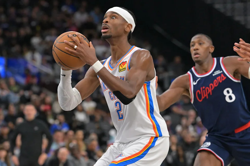 Apr 8, 2026; Inglewood, California, USA; Oklahoma City Thunder guard Shai Gilgeous-Alexander (2) drives past Los Angeles Clippers guard Kris Dunn (8) in the second half at Intuit Dome. Mandatory Credit: Jayne Kamin-Oncea-Imagn Images
