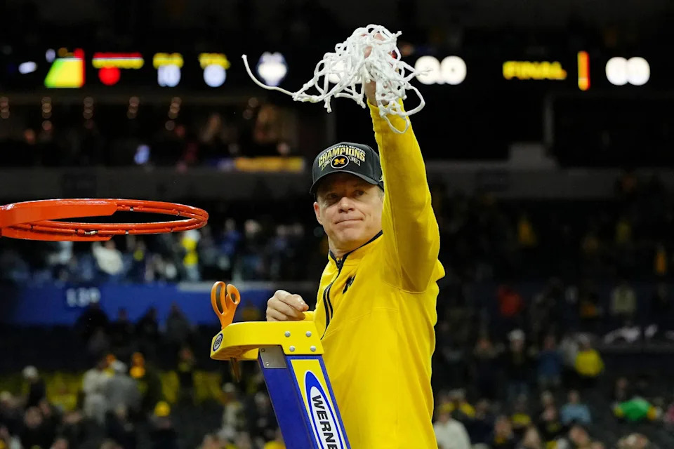 Dusty May cuts down the net in Indianapolis.