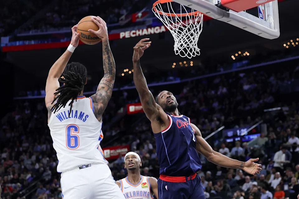 INGLEWOOD, CALIFORNIA - APRIL 08: Jaylin Williams #6 of the Oklahoma City Thunder and Kawhi Leonard #2 of the Los Angeles Clippers vie for a rebound during the first half of an NBA game at Intuit Dome on April 08, 2026 in Inglewood, California. NOTE TO USER: User expressly acknowledges and agrees that, by downloading and or using this photograph, User is consenting to the terms and conditions of the Getty Images License Agreement. (Photo by Ryan Sirius Sun/Getty Images)