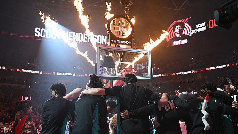 Teammates with the Portland Trail Blazers grab a moment of solidarity before beating the Sacramento Kings, 122-110, at the Moda Center on Sunday, April 12, 2026. (Steve Benham/KATU)