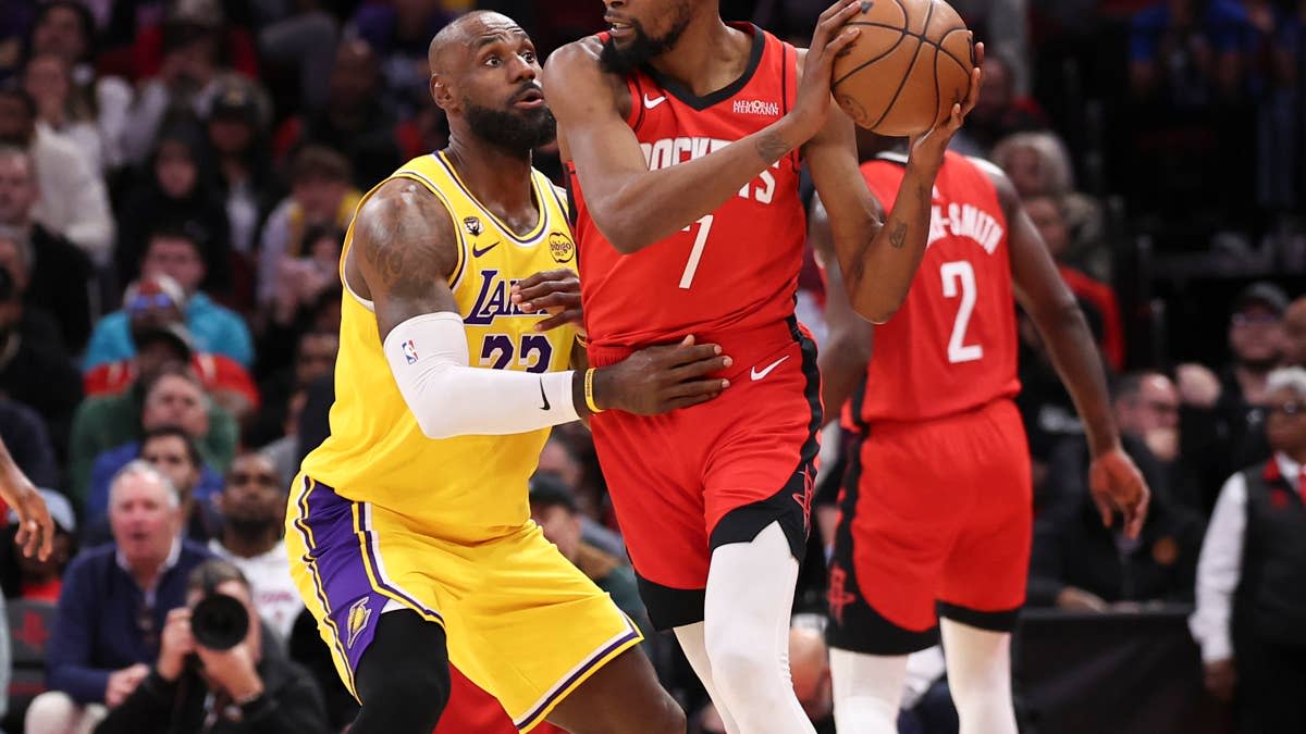 Los Angeles Lakers forward LeBron James (23) defends against Houston Rockets forward Kevin Durant (7).