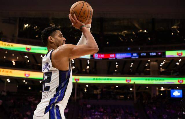 Sacramento Kings center Dylan Cardwell (32) shoots the first 3-pointer of his career during the second half against the Los Angeles Clippers at Golden 1 Center on Sunday.