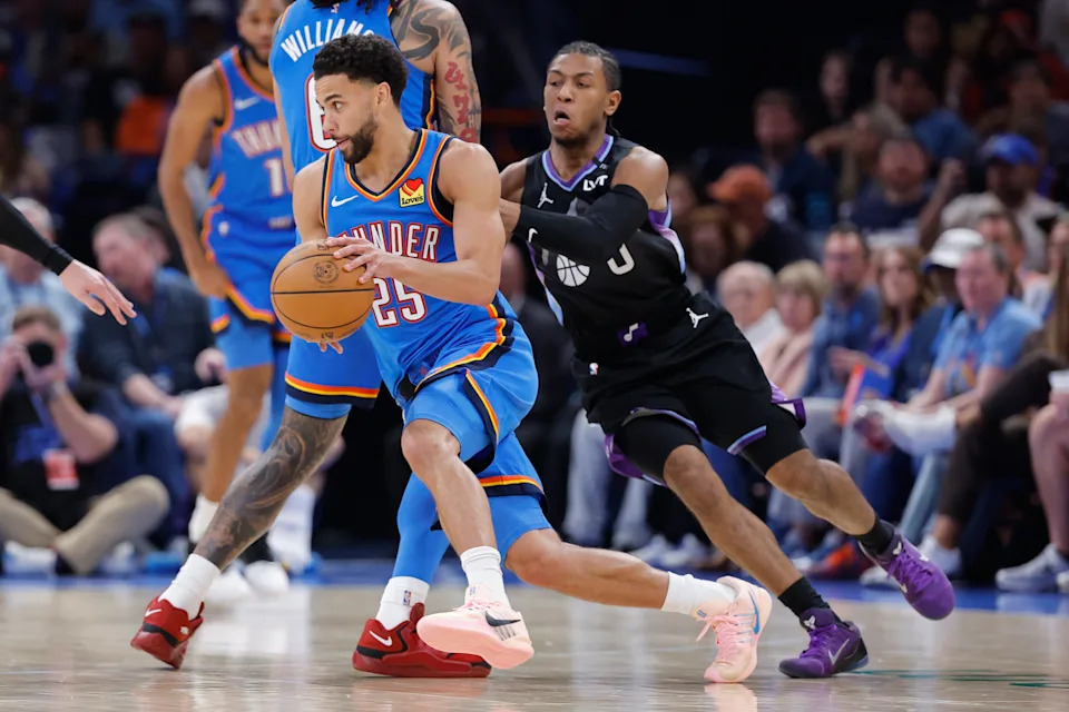 Apr 5, 2026; Oklahoma City, Oklahoma, USA; Oklahoma City Thunder guard Ajay Mitchell (25) moves past Utah Jazz guard Kennedy Chandler (0) during the second half at Paycom Center. Mandatory Credit: Alonzo Adams-Imagn Images