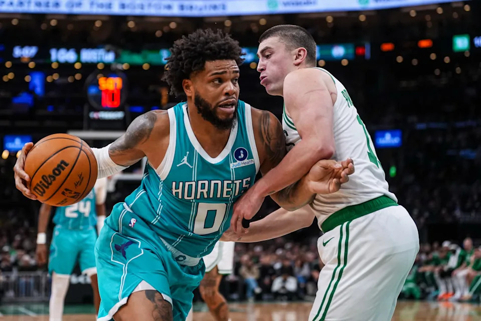 Apr 7, 2026; Boston, Massachusetts, USA; Charlotte Hornets forward Miles Bridges (0) drives the ball against Boston Celtics guard Payton Pritchard (11) in the second half at TD Garden. Mandatory Credit: David Butler II-Imagn Images