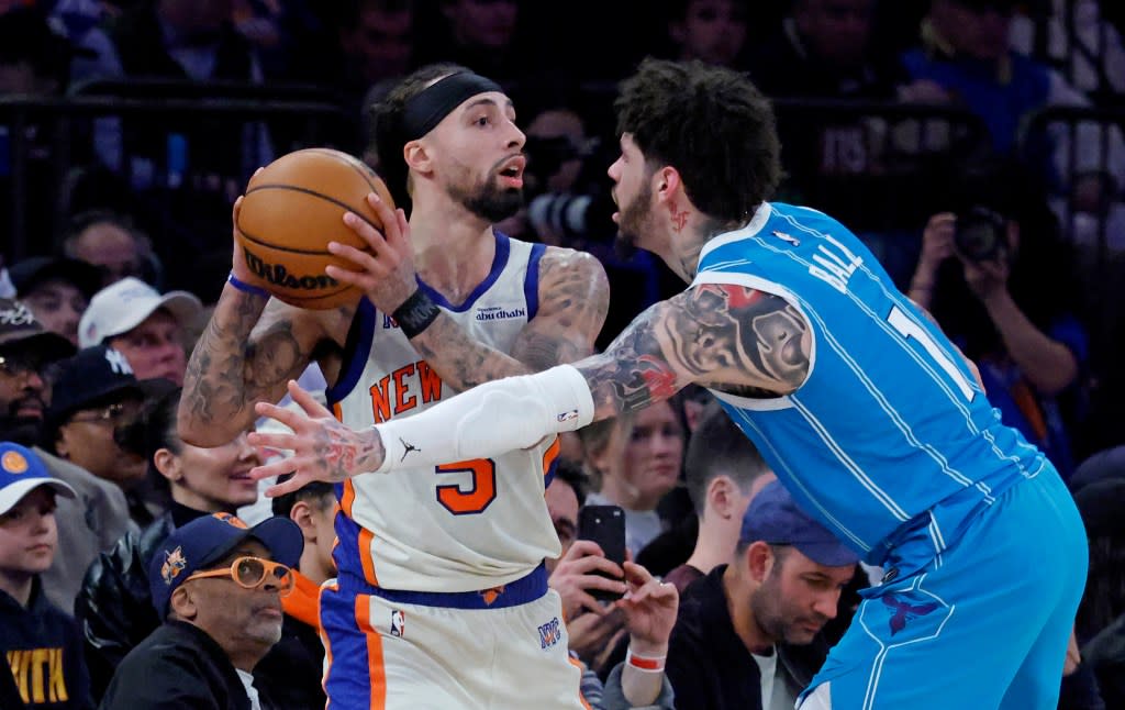 Charlotte Hornets guard LaMelo Ball defends against New York Knicks guard Jose Alvarado during the second half at Madison Square Garden in New York, New York, USA, Sunday, April 12, 2026. JASON SZENES FOR THE NEW YORK POST
