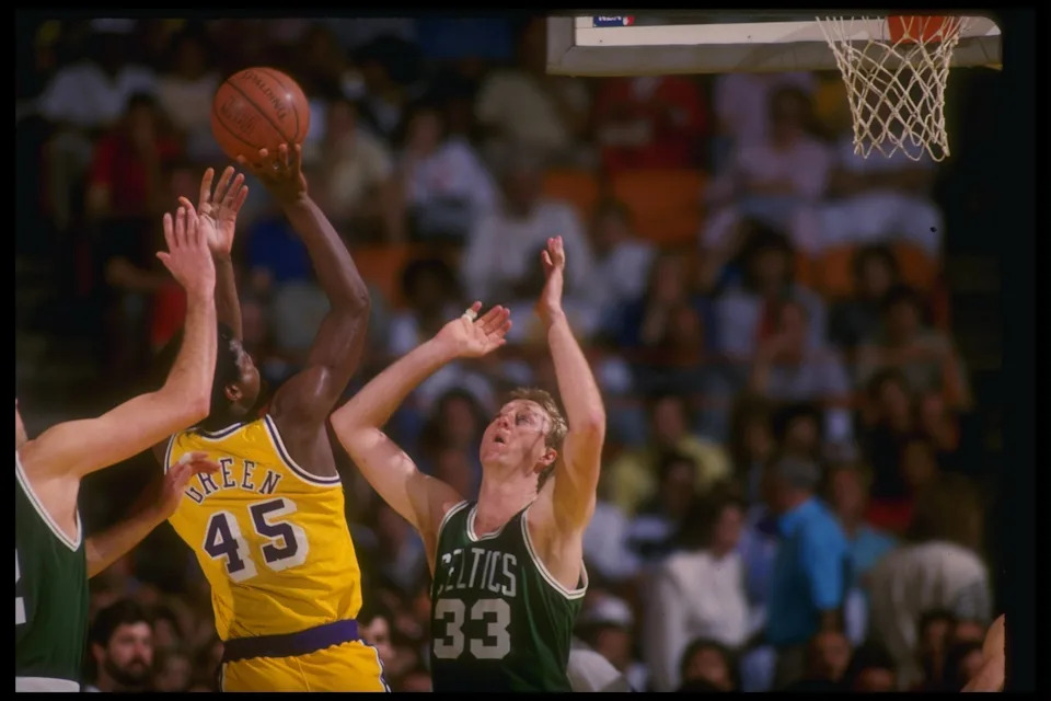 Undated: Forward Larry Bird of the Boston Celtics prepares to block an the shot of forward A.C. Green of the Los Angeles Lakers during the Celtics game versus the Celtics at the Forum in Inglewood, California. Mandatory Credit: Rick Stewart /Allsport