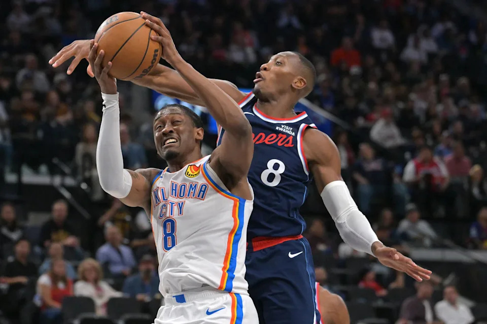 Apr 8, 2026; Inglewood, California, USA; Los Angeles Clippers guard Kris Dunn (8) defends Oklahoma City Thunder guard Jalen Williams (8) as he drives to the basket in the second half at Intuit Dome. Mandatory Credit: Jayne Kamin-Oncea-Imagn Images