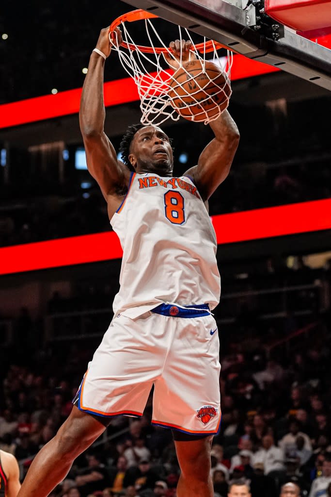 New York Knicks forward Og Anunoby (8) dunks the ball against the Atlanta Hawks during the first half at State Farm Arena. IMAGN IMAGES via Reuters Connect