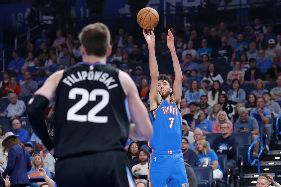 Apr 5, 2026; Oklahoma City, Oklahoma, USA; Oklahoma City Thunder center Chet Holmgren (7) shoots a three point basket against the Utah Jazz during the first quarter at Paycom Center. Mandatory Credit: Alonzo Adams-Imagn Images