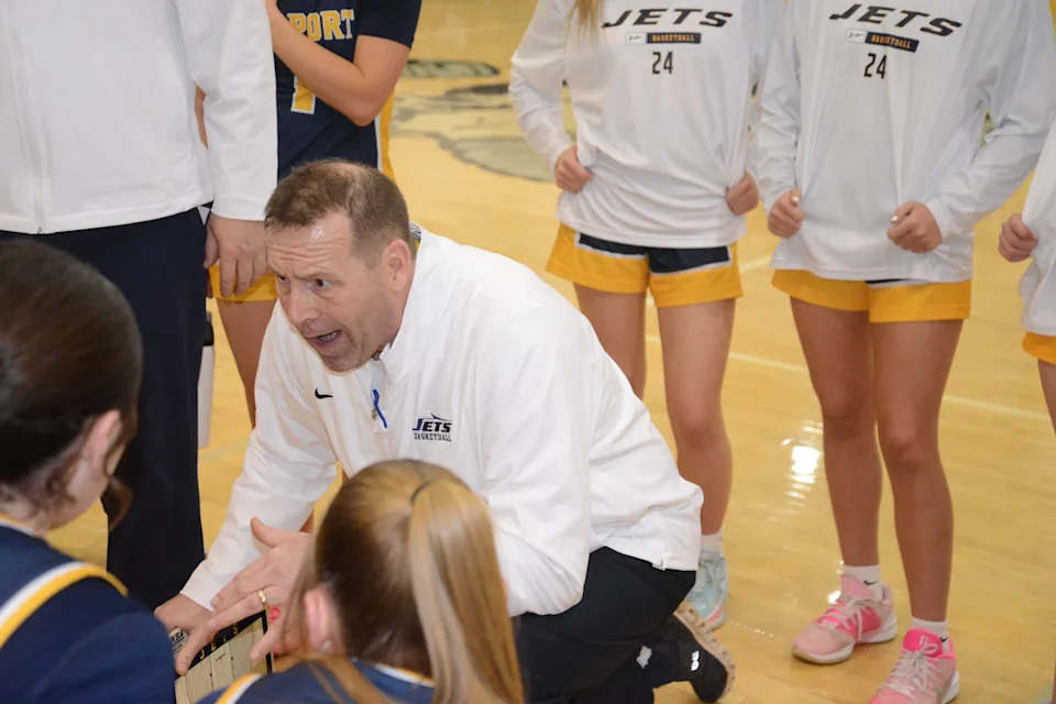 Airport girls basketball coach Darrell Mossburg talks to his team during a 60-50 win over Flat Rock in the finals of the Division 2 Girls Basketball District at Flat Rock on Friday, March 6, 2026.