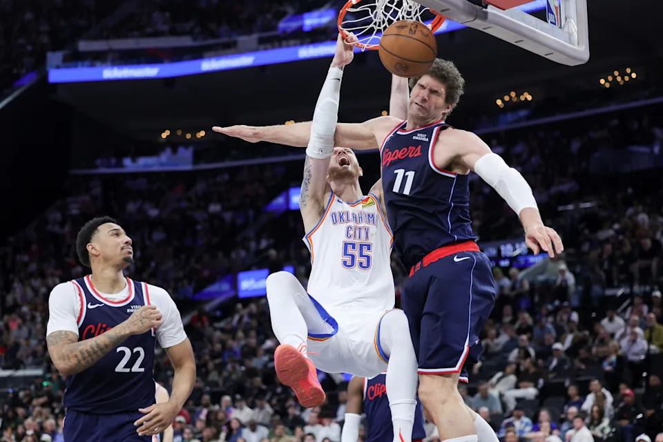 INGLEWOOD, CALIFORNIA - APRIL 08: Isaiah Hartenstein #55 of the Oklahoma City Thunder dunks against Brook Lopez #11 of the Los Angeles Clippers during the second half of an NBA game at Intuit Dome on April 08, 2026 in Inglewood, California. NOTE TO USER: User expressly acknowledges and agrees that, by downloading and or using this photograph, User is consenting to the terms and conditions of the Getty Images License Agreement. (Photo by Ryan Sirius Sun/Getty Images)