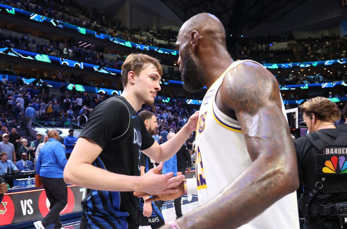 Dallas Mavericks forward Cooper Flagg (32) greets Los Angeles Lakers forward LeBron James (23) after the game at American Airlines Center.Kevin Jairaj-Imagn Images