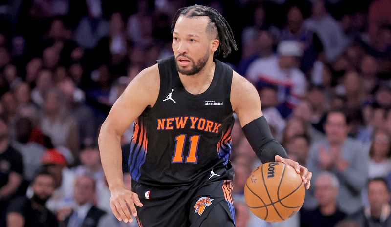 Jalen Brunson (11) controls the ball against the Atlanta Hawks.