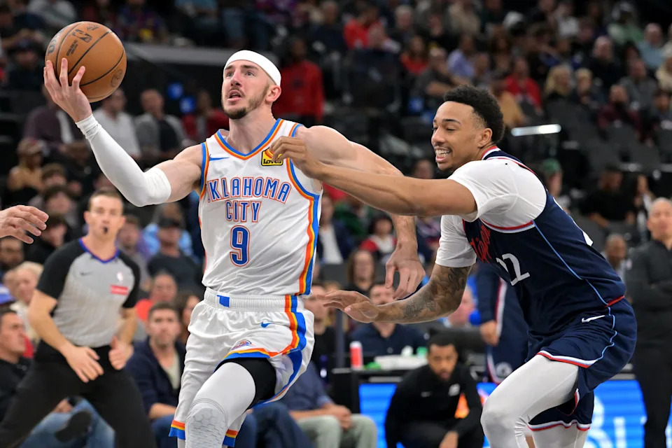Apr 8, 2026; Inglewood, California, USA; Oklahoma City Thunder guard Alex Caruso (9) drives past Los Angeles Clippers guard Jordan Miller (22) in the second half at Intuit Dome. Mandatory Credit: Jayne Kamin-Oncea-Imagn Images