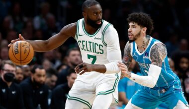Celtics guard Jaylen Brown, who had 35 points, looks to make his move against Hornets guard LaMelo Ball during the first quarter of Tuesday night's 113-102 victory at TD Garden.