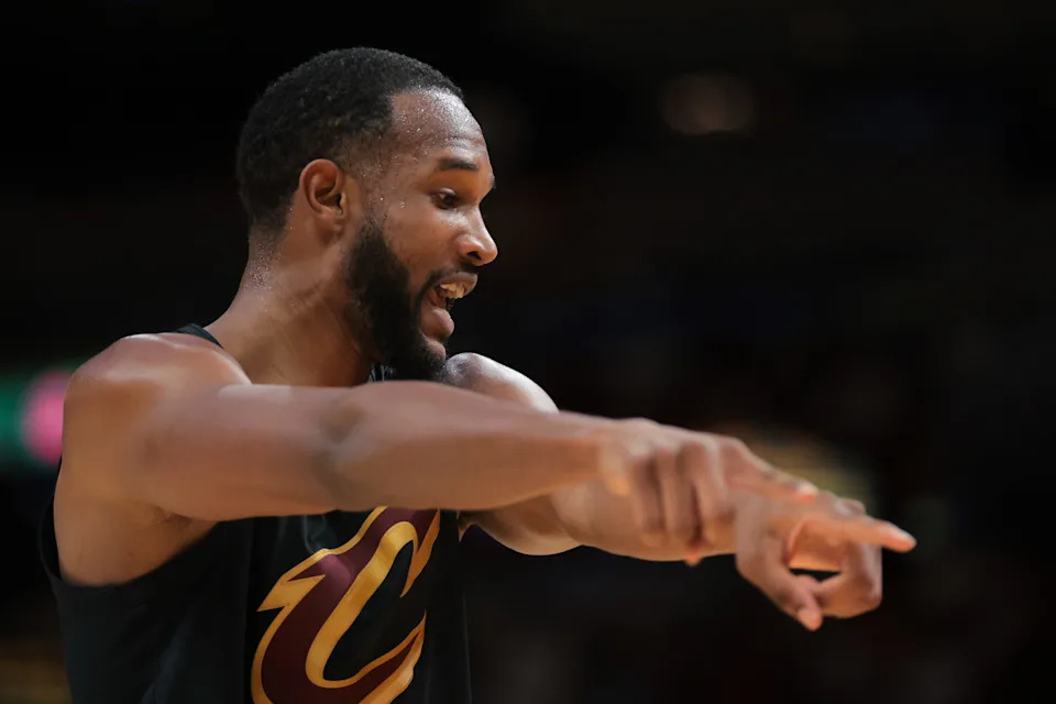 Cavaliers forward Evan Mobley signals as he talks to a referee in the second quarter in Game 4 of a first-round playoff series against the Heat, April 28, 2025, in Miami.