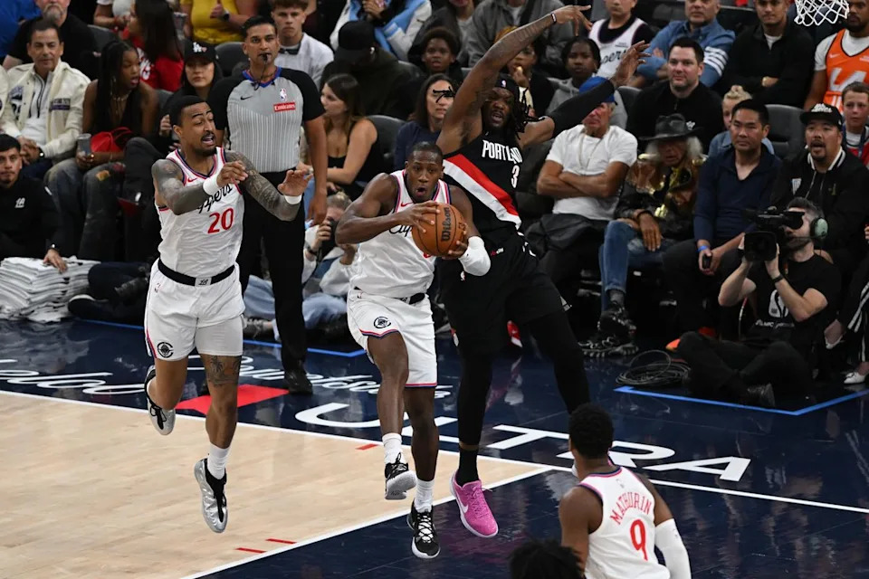 Los Angeles Clippers guard Kris Dunn (8) makes an interception during a game between the Los Angeles Clippers and the Portland Trailblazers on Tuesday, March 31, 2026 at Intuit Dome in Inglewood Calif