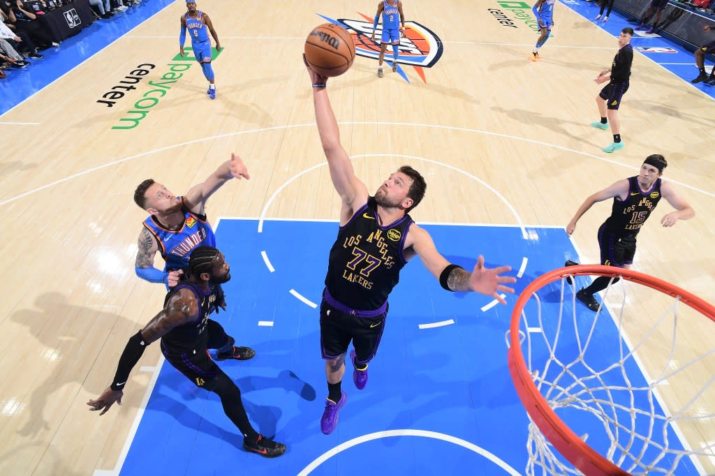 Luka Doncic of the Los Angeles Lakers grabs a rebound during the game against the Oklahoma City Thunder on April 2, 2026 at Paycom Center in Oklahoma City, Oklahoma. (Photo by Adam Pantozzi/NBAE via Getty Images) NBAE via Getty Images