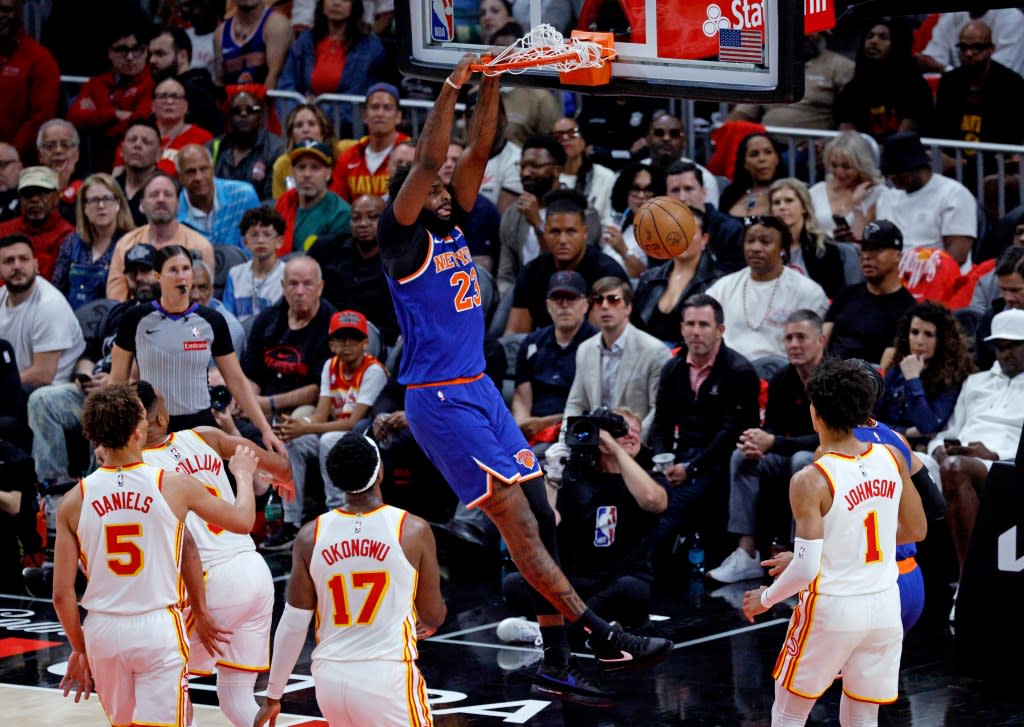 Knicks center Mitchell Robinson (23) slam the ball for his lone two points of Game 3 on April 23, 2026. Charles Wenzelberg / New York Post