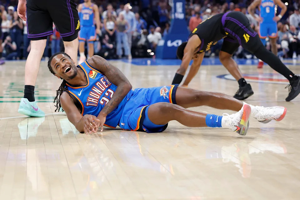Apr 2, 2026; Oklahoma City, Oklahoma, USA; Oklahoma City Thunder guard Cason Wallace (22) laughs after a diving play against the Los Angeles Lakers during the second half at Paycom Center. Mandatory Credit: Alonzo Adams-Imagn Images