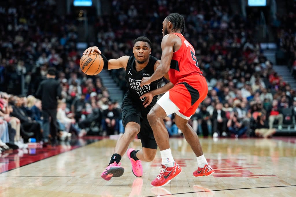 Brooklyn Nets Malachi Smith (18) dribbles against Toronto Raptors Immanuel Quickley (5) during the first half at Scotiabank Arena. IMAGN IMAGES via Reuters Connect