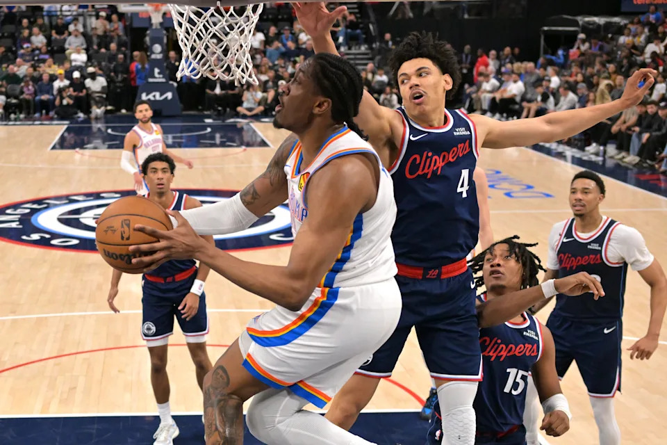 Apr 8, 2026; Inglewood, California, USA; Oklahoma City Thunder guard Jalen Williams (8) drives past Los Angeles Clippers guard Kobe Sanders (4) for a basket in the second half at Intuit Dome. Mandatory Credit: Jayne Kamin-Oncea-Imagn Images