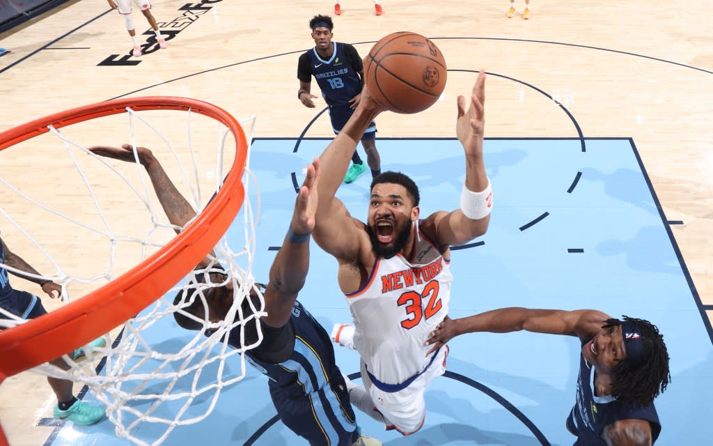 Karl-Anthony Towns, who scored 20 points to go along with 11 rebounds and 11 assists, goes up for a layup during the Knicks’ win over the Grizzlies. NBAE via Getty Images