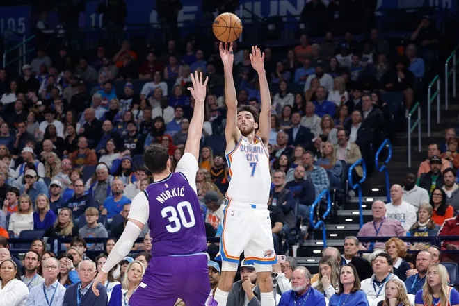 Jan 7, 2026; Oklahoma City, Oklahoma, USA; Oklahoma City Thunder center/forward Chet Holmgren (7) shoots a three point basket against the Utah Jazz during the second quarter at Paycom Center. Mandatory Credit: Alonzo Adams-Imagn Images